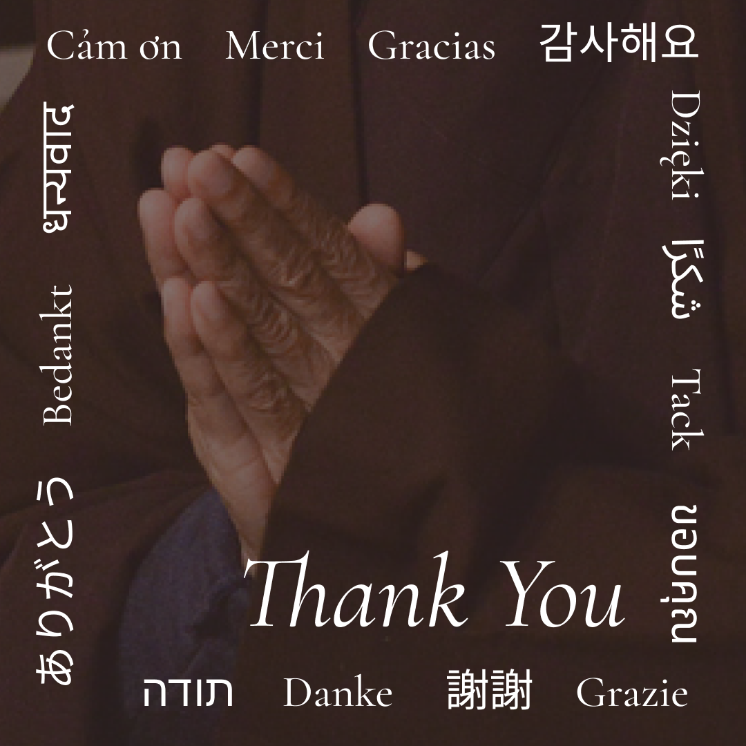 Thay's hands in a bowing gesture with the words Thank You in multiple languages